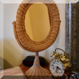 DM11. Wicker framed vanity mirror.